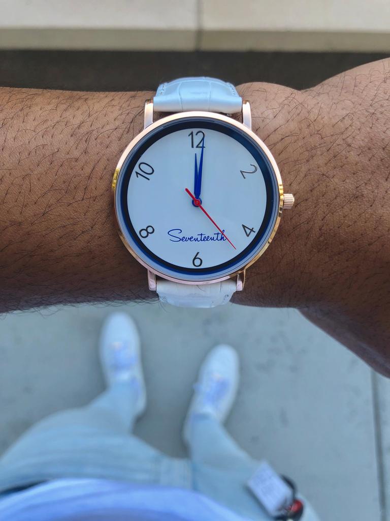 A White Leather Strap Muse