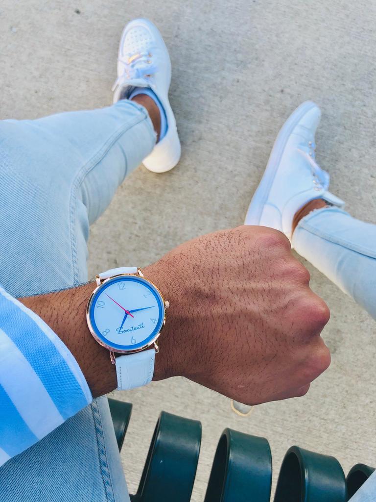 A White Leather Strap Muse